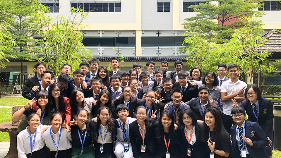 Shuen Ling (first row, fourth from left) with her peers in the River Valley MUN Social, Humanitarian &amp; Cultural Committee in 2019