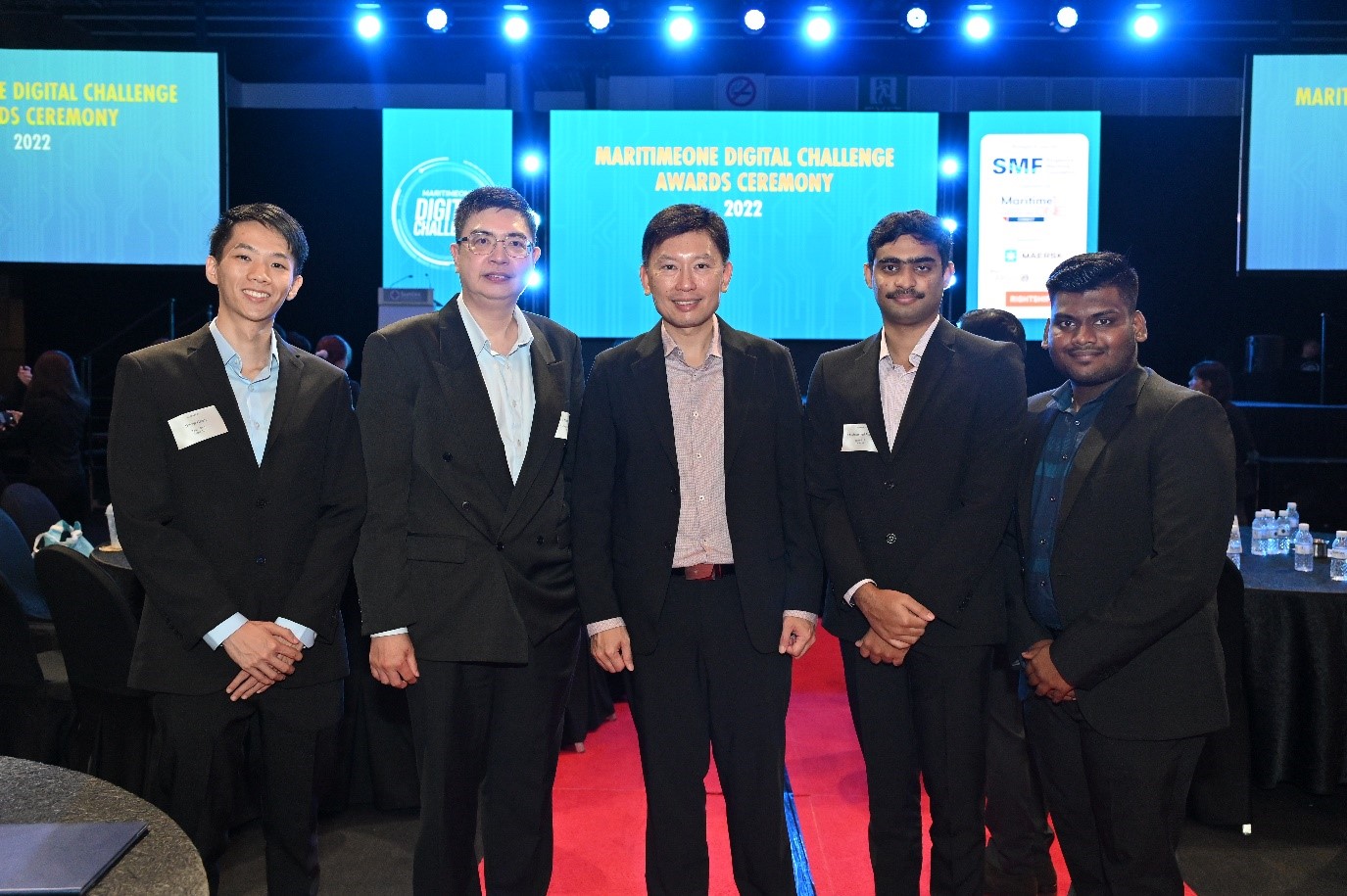 From left: Darryl Chan, Eddie Ng (PSA Head of Digital & Data Strategy), Minister Chee, Madhih and Guhan