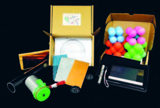 Contents of the shoebox-sized kits sent to Physics students’ homes.